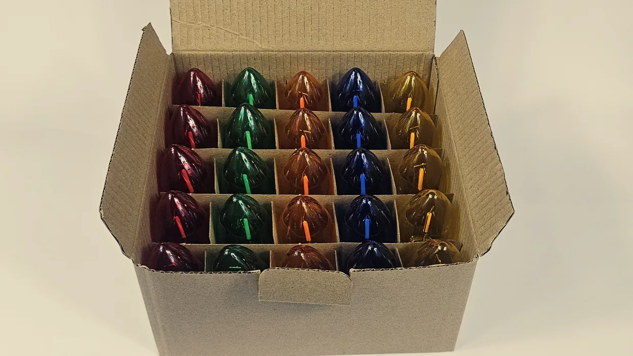 25-bulb Crystal NEO mix in its tray, coloured LED filaments visible