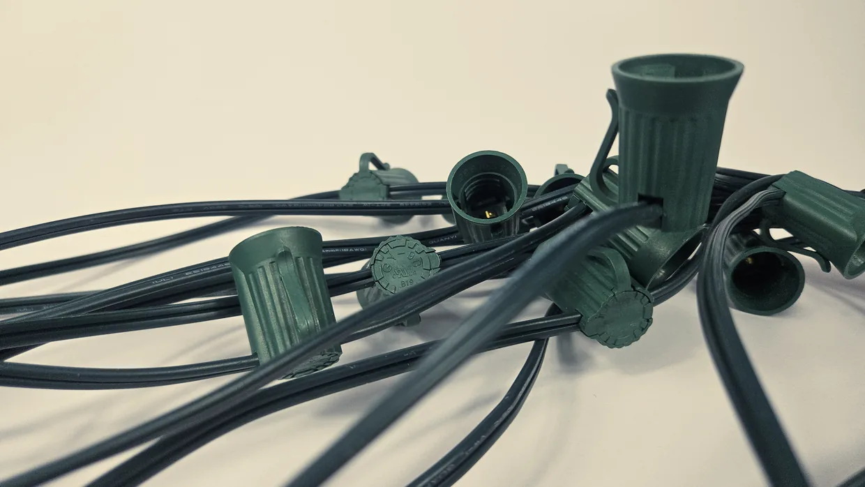 Green SPT-1W wiring harness coiled, showing C9 E17 sockets